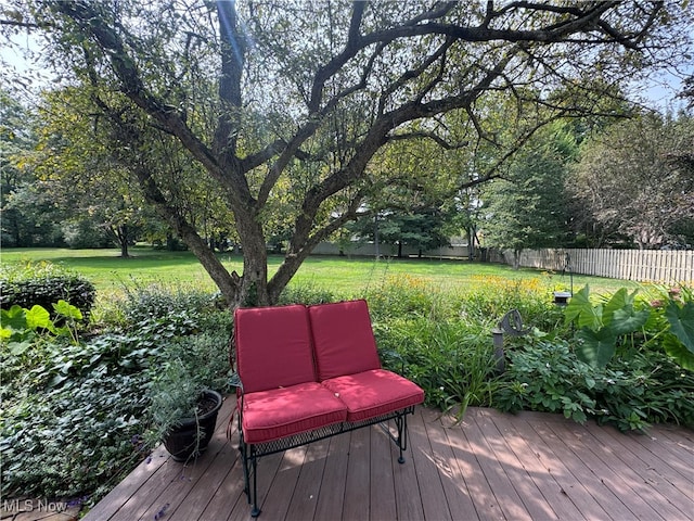 deck featuring a lawn