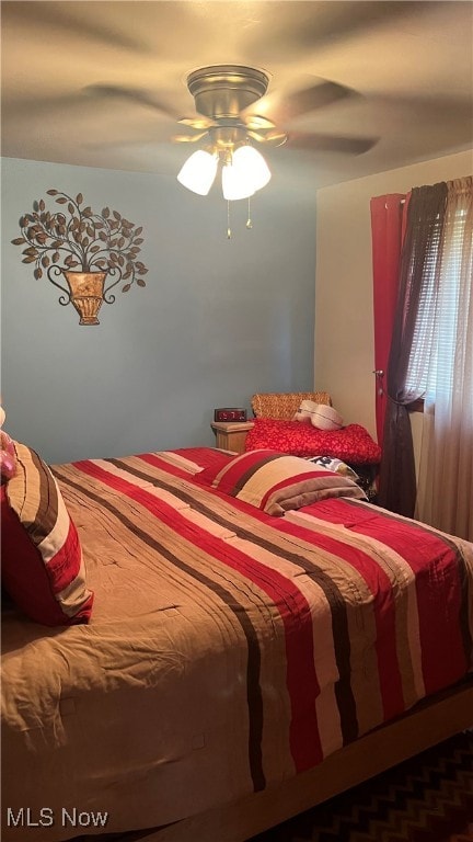 bedroom featuring ceiling fan