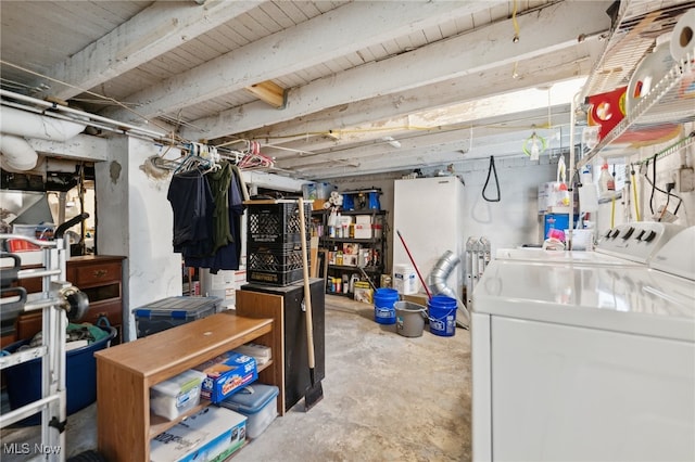 basement featuring washer and dryer