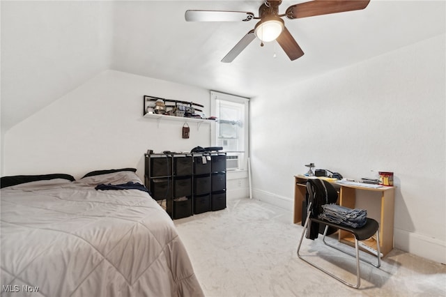 bedroom with lofted ceiling, ceiling fan, and light carpet