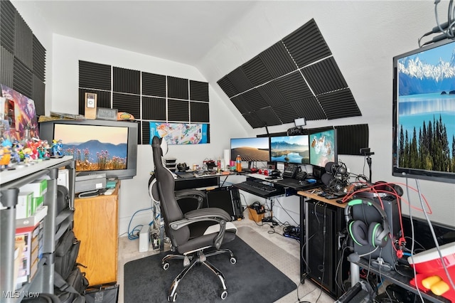 home office featuring lofted ceiling