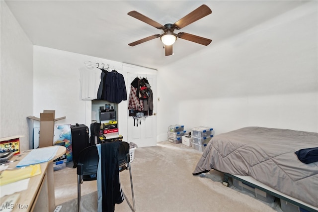 bedroom with light colored carpet and ceiling fan