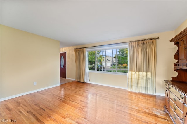 empty room featuring light hardwood / wood-style floors