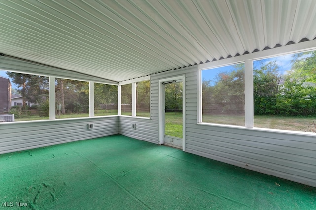 unfurnished sunroom with lofted ceiling