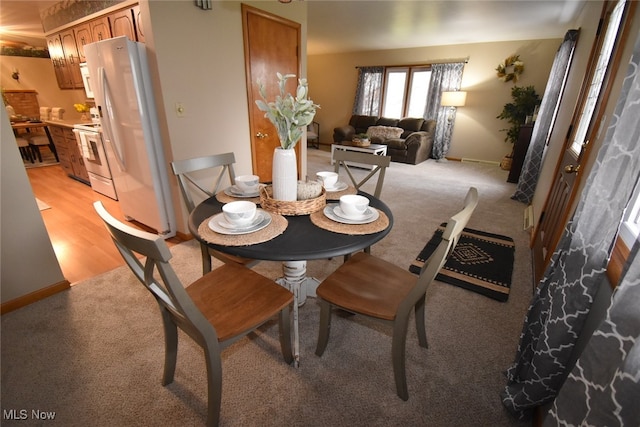 dining room featuring light wood-type flooring