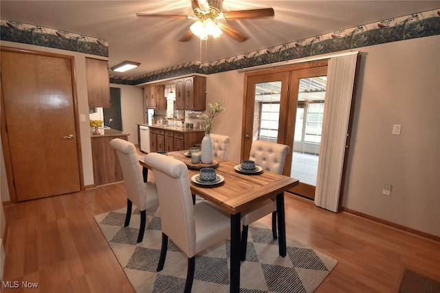 dining area featuring ceiling fan, light hardwood / wood-style flooring, and french doors