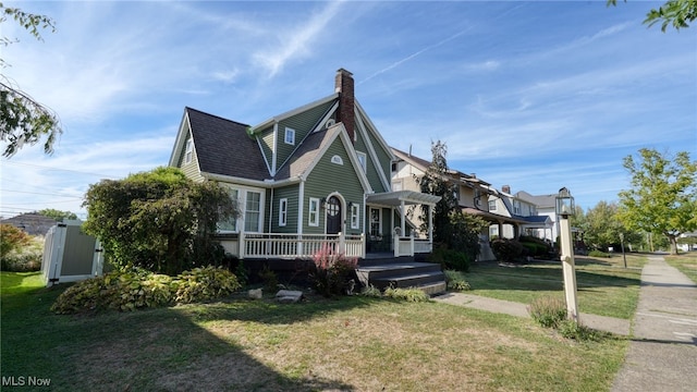 view of side of home featuring a lawn