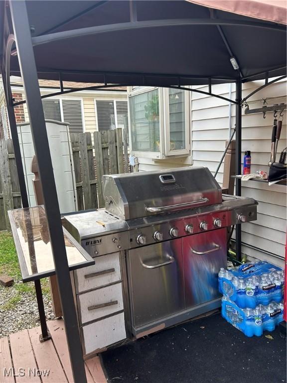 view of patio / terrace featuring a grill and a gazebo