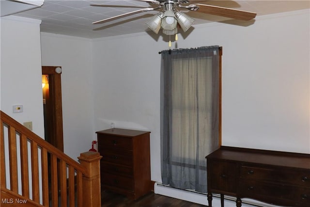 interior space featuring stairs, ornamental molding, and a ceiling fan