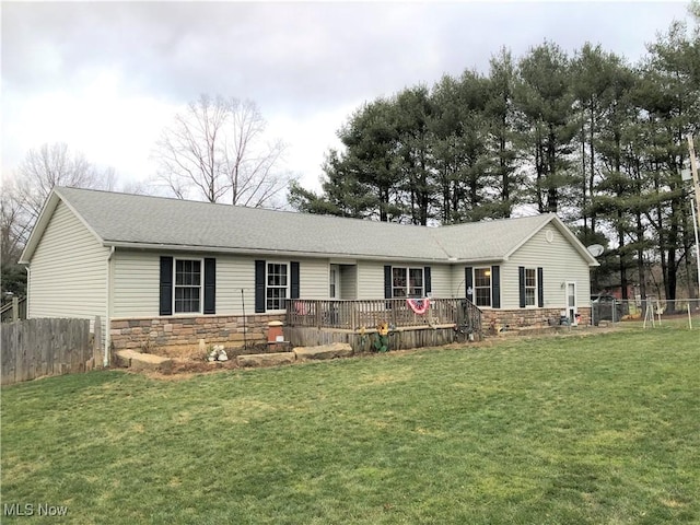 78560 Kinsey Orchard Rd, Freeport, OH 43973 - ranch-style house featuring stone siding, fence, a front lawn, and a wooden deck