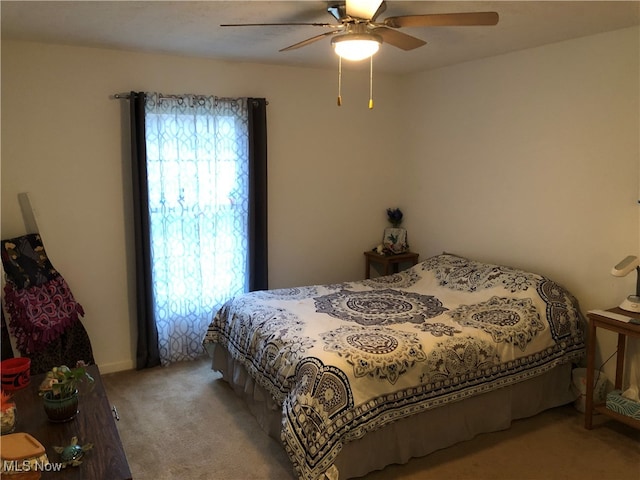 bedroom with light colored carpet and ceiling fan