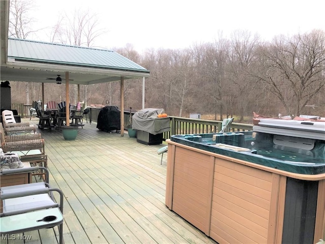 78560 Kinsey Orchard Rd, Freeport, OH 43973 - deck with a hot tub, ceiling fan, outdoor dining space, and area for grilling