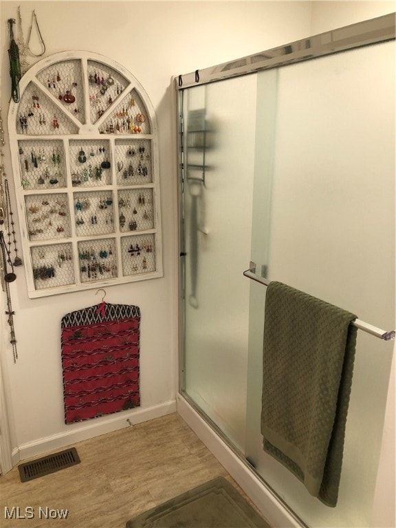 bathroom featuring hardwood / wood-style floors