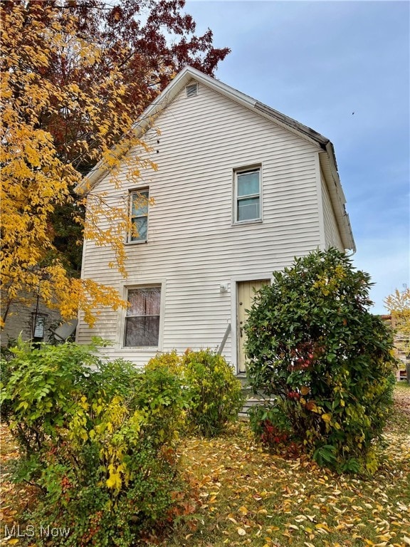 view of property exterior with a garage