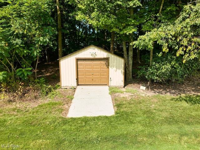 exterior space featuring a yard and a garage