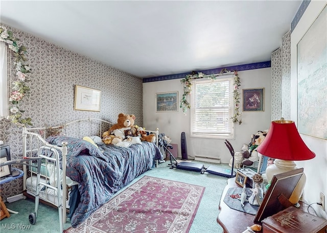 bedroom featuring baseboard heating and carpet floors