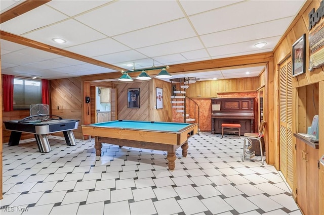 playroom featuring billiards, a paneled ceiling, and wood walls