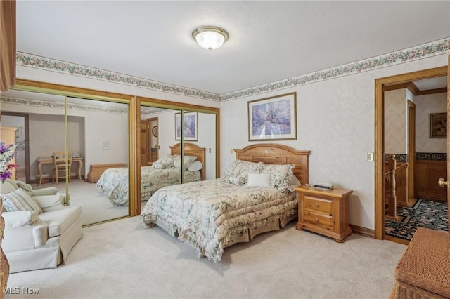 carpeted bedroom featuring crown molding