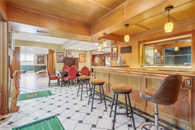 bar featuring wooden walls, decorative light fixtures, butcher block countertops, and wooden ceiling