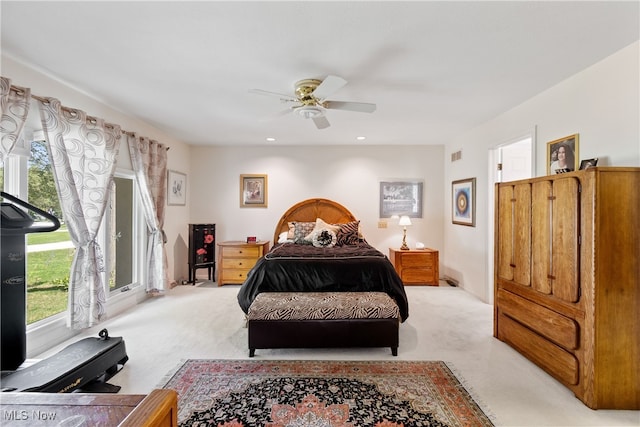 carpeted bedroom featuring ceiling fan