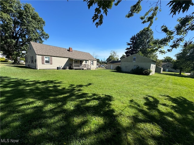 view of yard with a deck