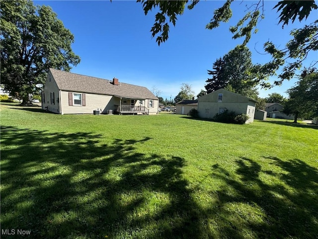 view of yard featuring a deck