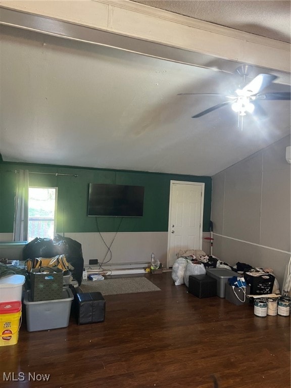 living room with ceiling fan and wood-type flooring