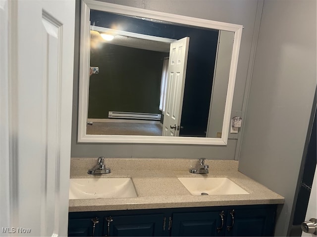 bathroom featuring vanity and a baseboard radiator