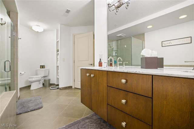 full bathroom featuring a textured ceiling, vanity, shower with separate bathtub, tile patterned flooring, and toilet