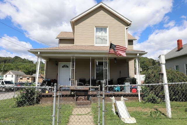 1631 Globe St, East Liverpool, OH 43920 - view of front of home featuring a porch, a gate, and a shingled roof
