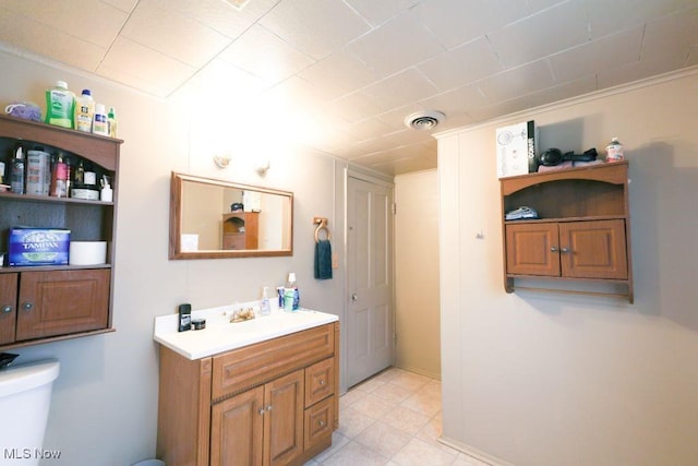 1631 Globe St, East Liverpool, OH 43920 - bathroom featuring vanity, toilet, and tile patterned flooring