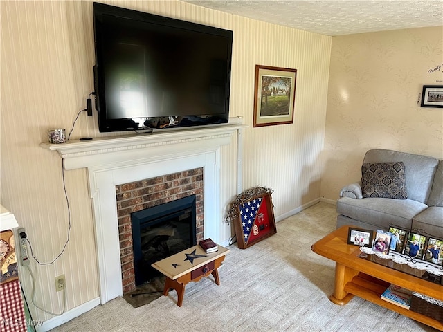 carpeted living room with a textured ceiling and a brick fireplace