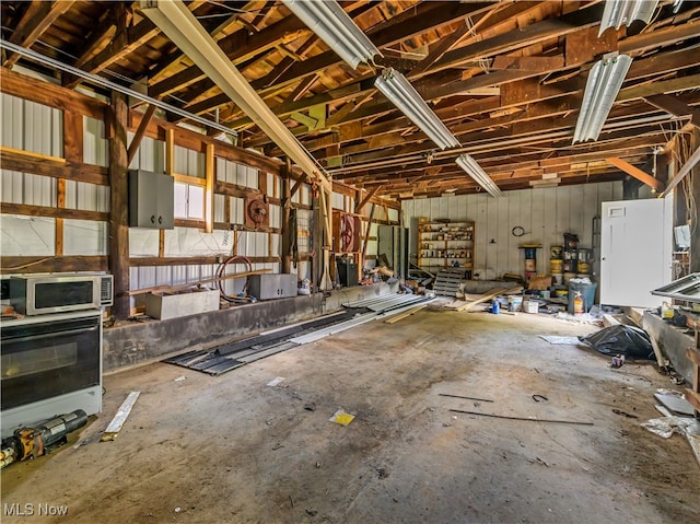 misc room with concrete flooring