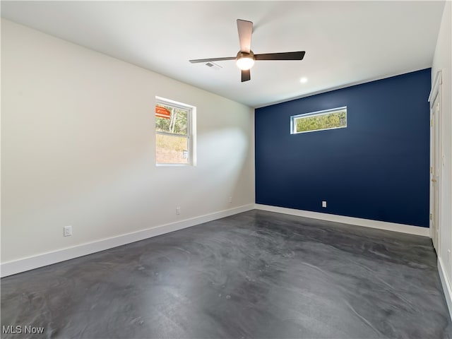 spare room featuring ceiling fan