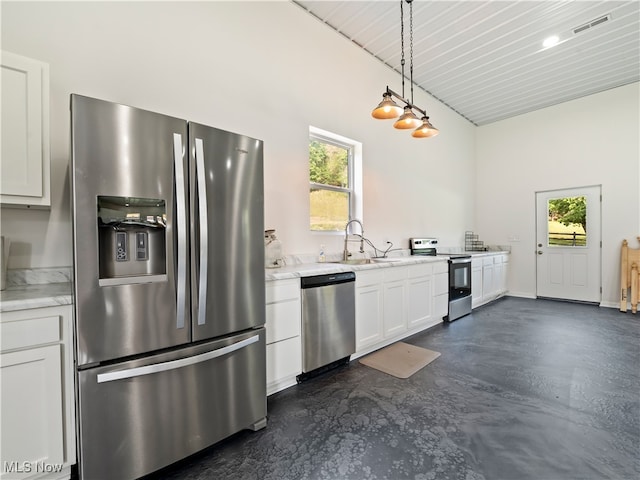 kitchen featuring appliances with stainless steel finishes, sink, wooden ceiling, white cabinetry, and hanging light fixtures