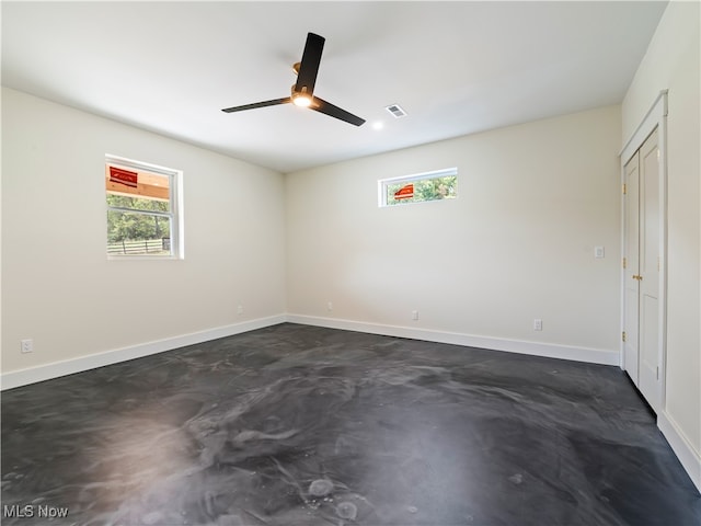 unfurnished room featuring ceiling fan