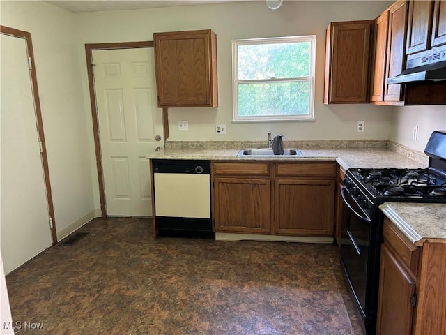 kitchen featuring a sink, light countertops, black gas range, under cabinet range hood, and dishwasher