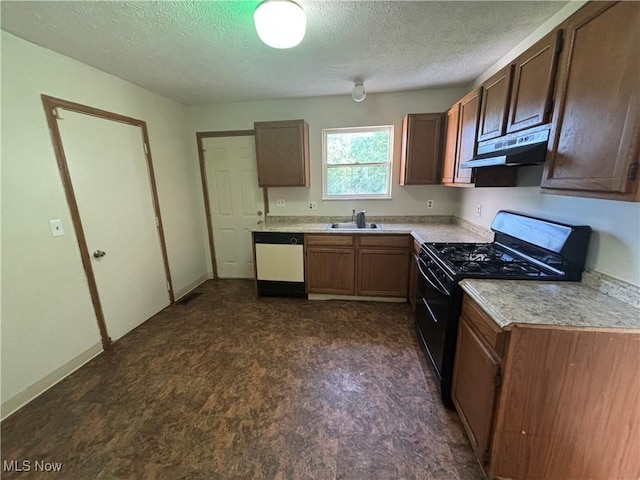 kitchen featuring under cabinet range hood, a sink, white dishwasher, light countertops, and black range with gas cooktop