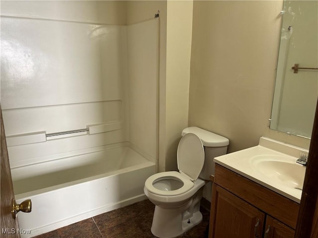 full bathroom with vanity, tile patterned floors, toilet, and tub / shower combination