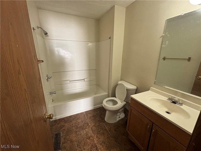 full bathroom with vanity, toilet, visible vents, and shower / washtub combination