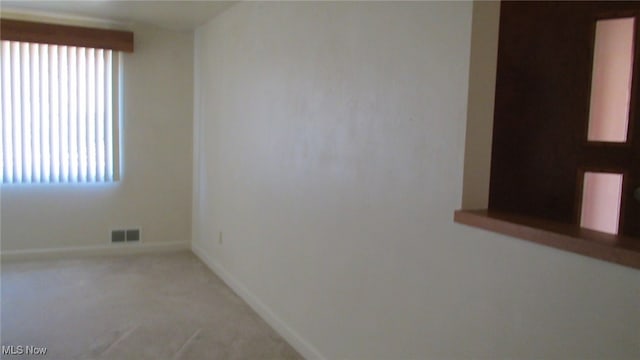 empty room featuring carpet