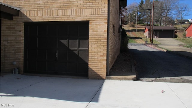 view of exterior entry featuring a garage