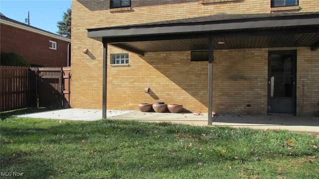 exterior space with a yard and a patio