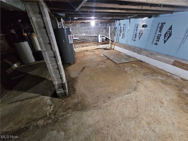 unfinished basement with water heater