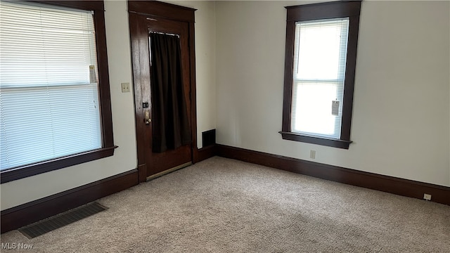 view of carpeted spare room