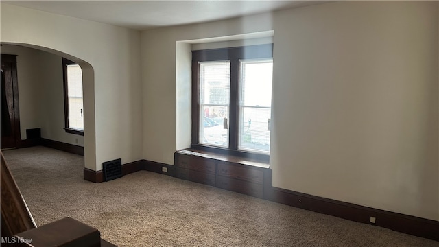 empty room with carpet floors