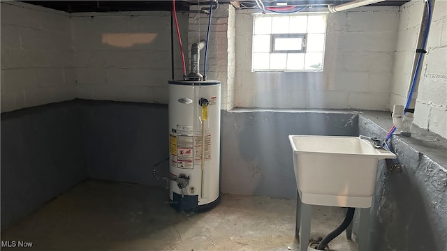 basement with sink and water heater