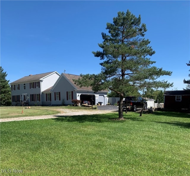 view of yard featuring a garage