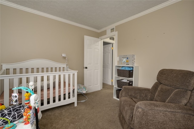 carpeted bedroom featuring a crib, a textured ceiling, and crown molding