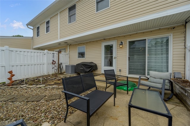 view of patio / terrace with area for grilling and central AC